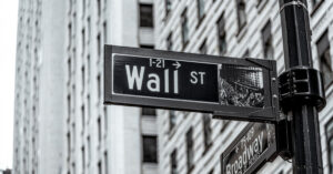 Black and white image of Wall Street street sign