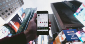 a phone on social media being held in times square