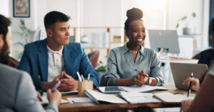Meeting, job interview and business people in office for recruitment, vacancy or hiring opportunity. Happy, discussion and hr managers with candidates for resume with onboarding process in workplace.