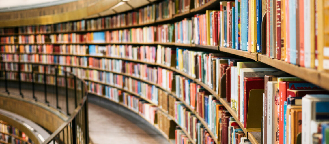 book shelves filled with books at a library