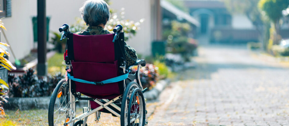 woman with a disability sitting in a wheelchair