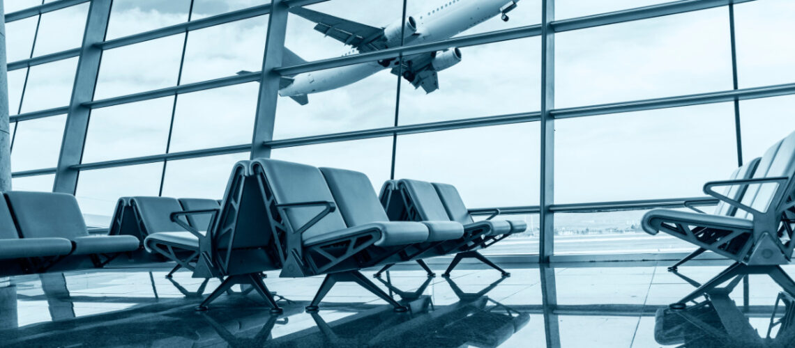 Empty seats in an airport waiting area.